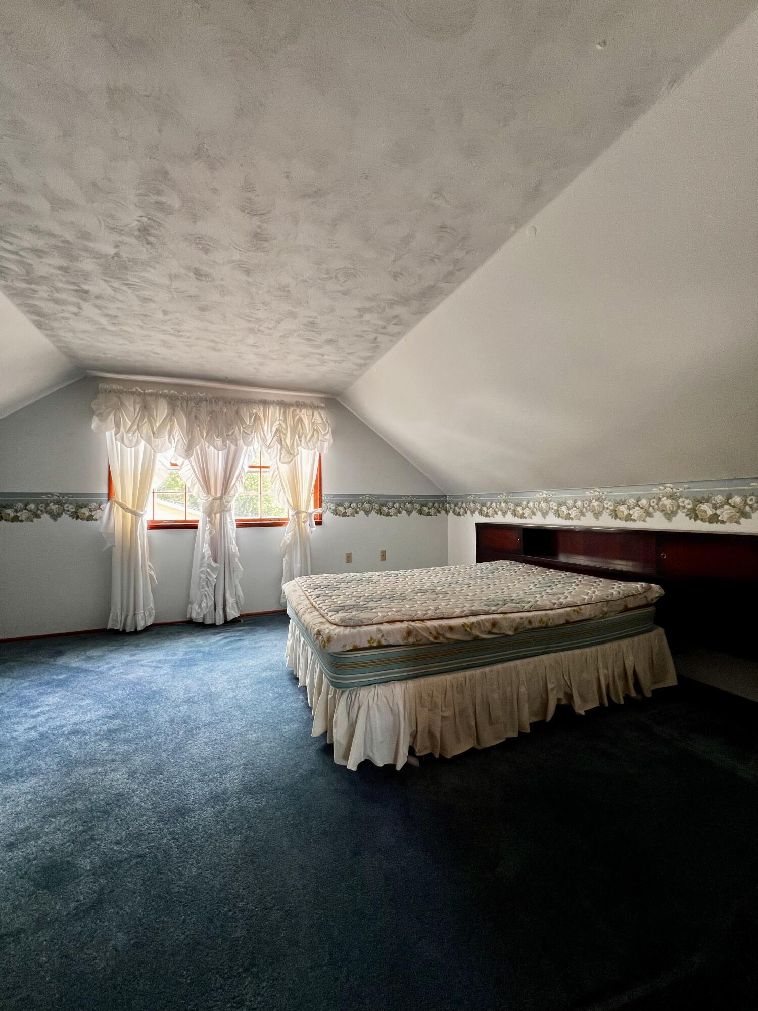 772 Imperial Road Valparaiso, IN 46385 - Photo 13 of 20 a spacious bedroom with a bed and window