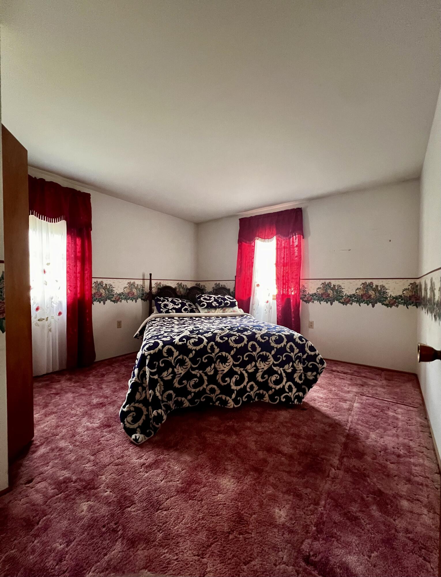772 Imperial Road Valparaiso, IN 46385 - Photo 6 of 20 a bedroom with a bed and window