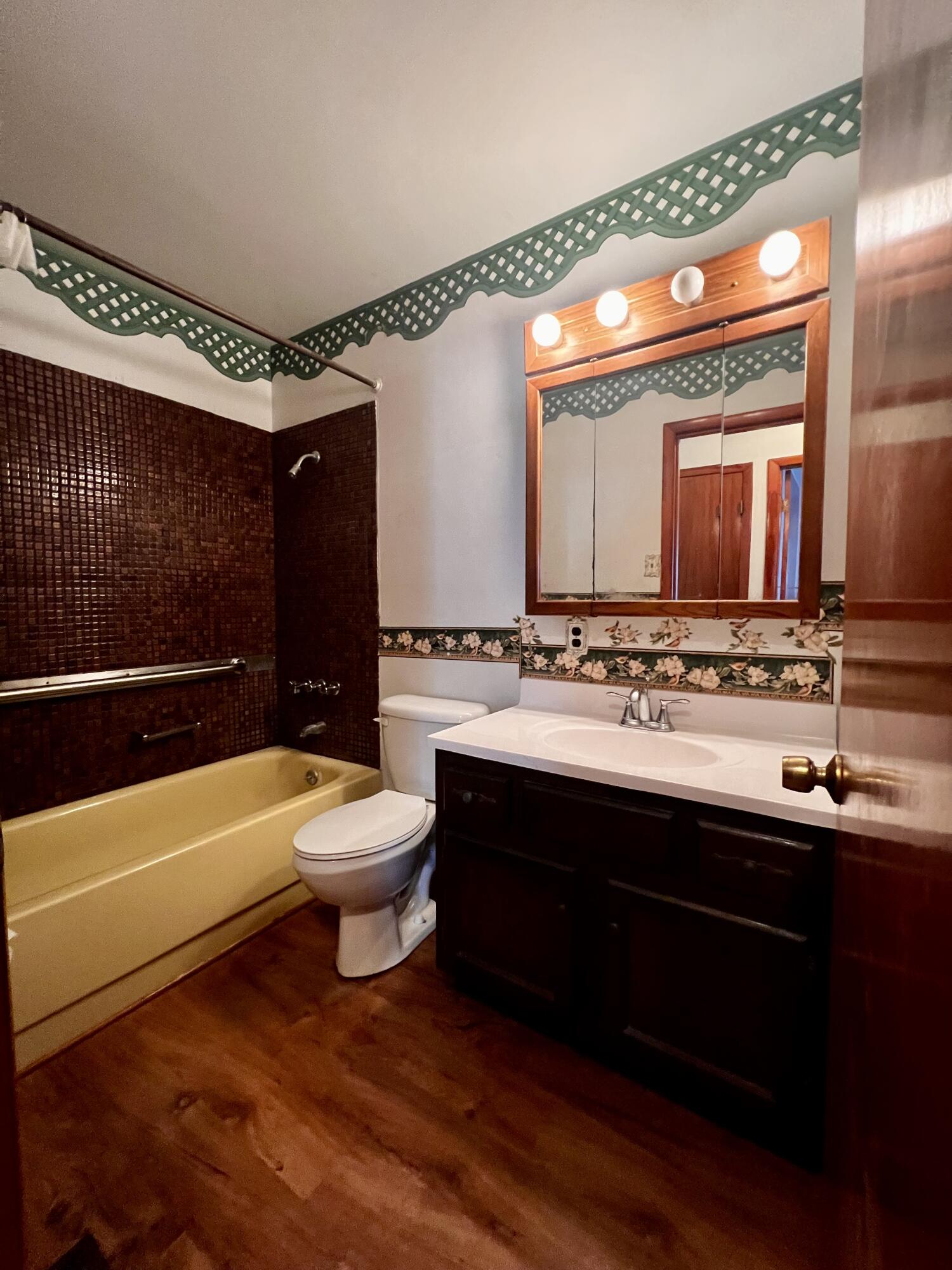 772 Imperial Road Valparaiso, IN 46385 - Photo 7 of 20 a bathroom with a sink a toilet and a bathtub