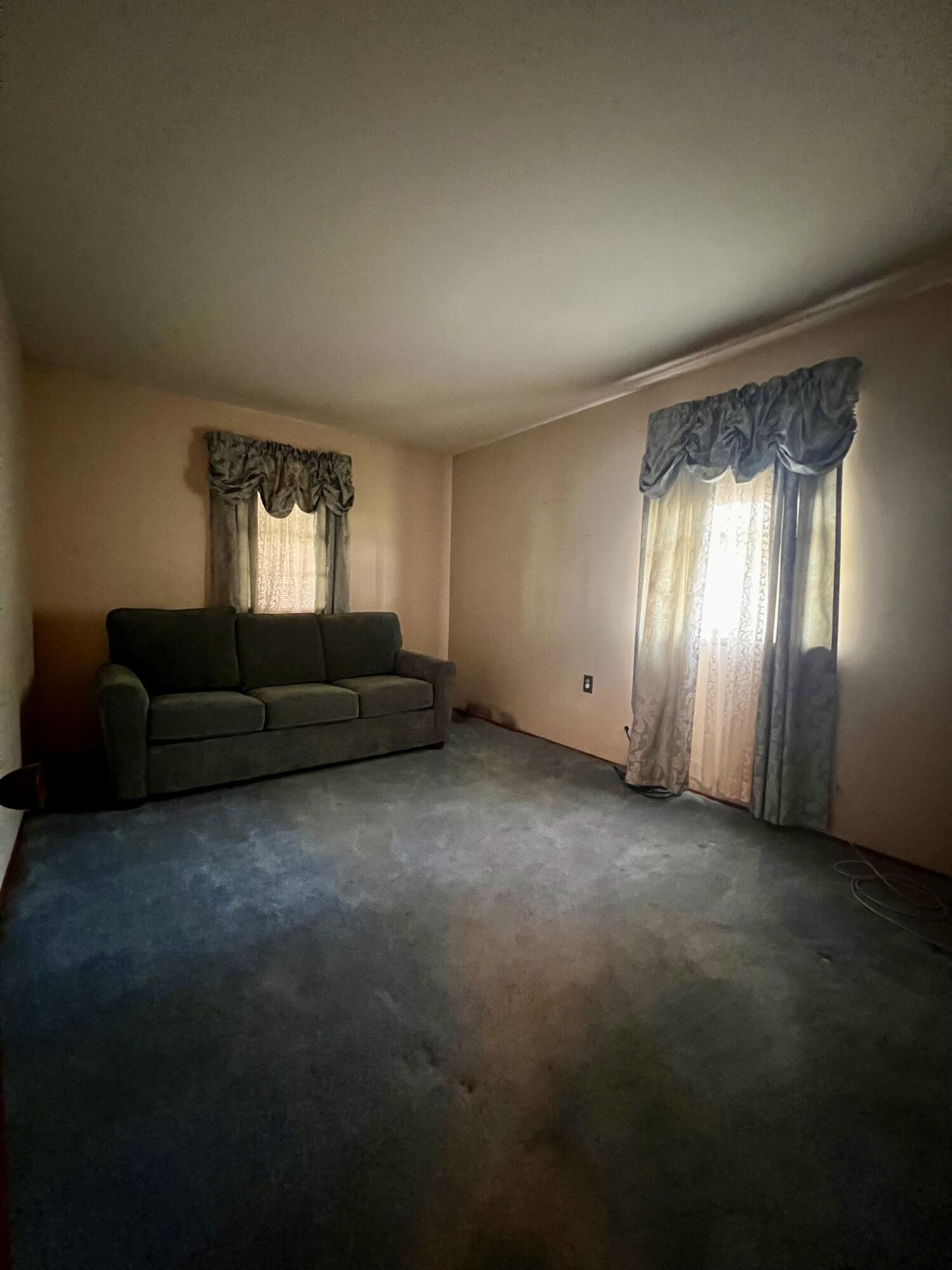772 Imperial Road Valparaiso, IN 46385 - Photo 8 of 20 a living room with furniture and a large window