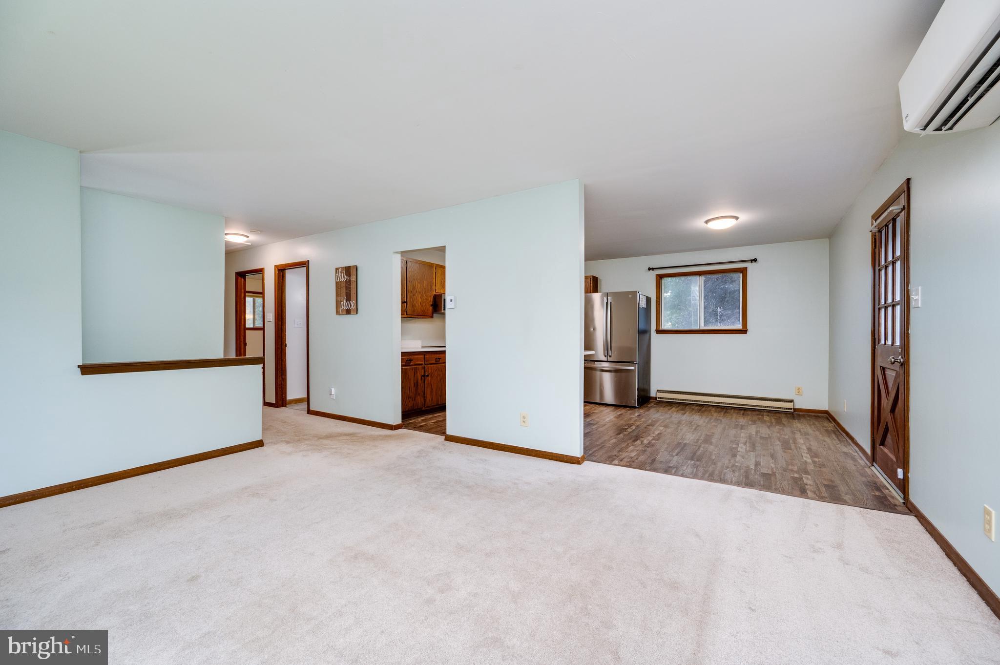 1029 Crestview Avenue Reading, PA 19607 - Photo 11 of 44 an empty room with windows and refrigerator