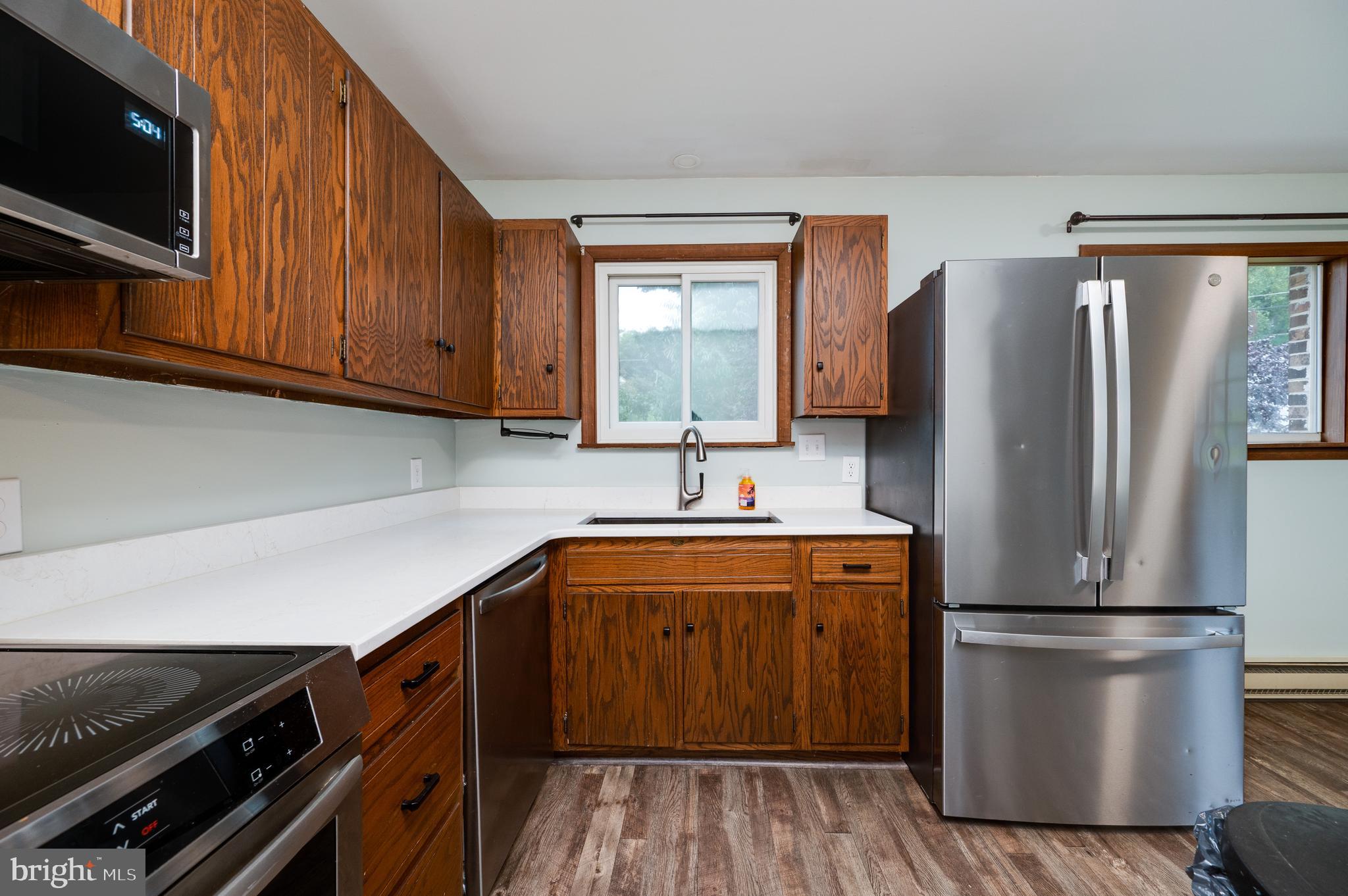 1029 Crestview Avenue Reading, PA 19607 - Photo 18 of 44 a kitchen with a refrigerator and a sink