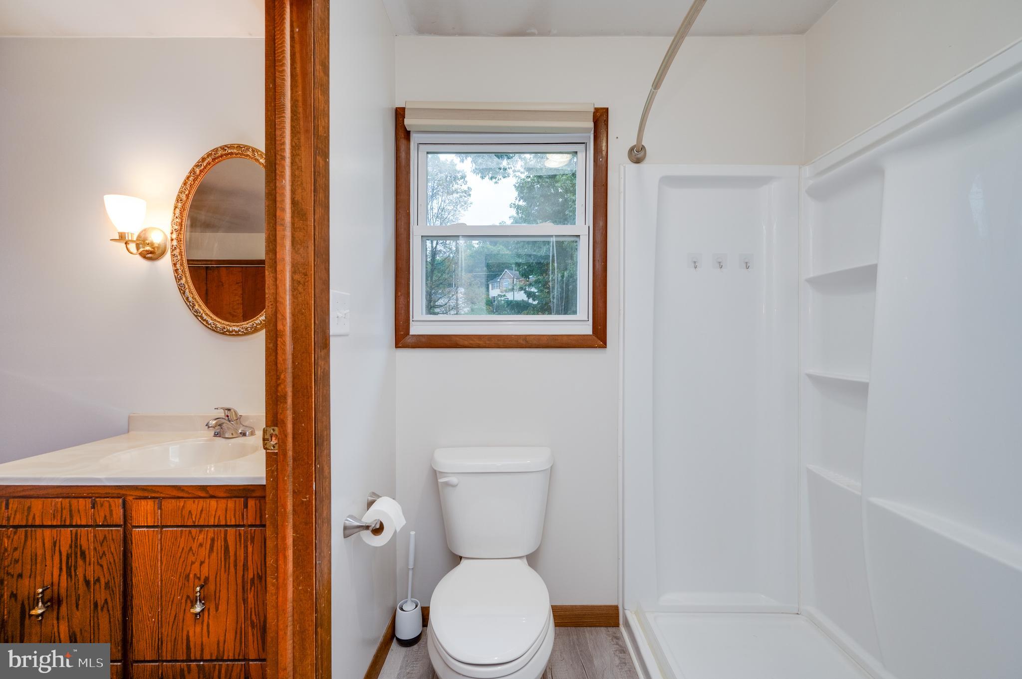 1029 Crestview Avenue Reading, PA 19607 - Photo 21 of 44 a bathroom with a toilet a sink and tub