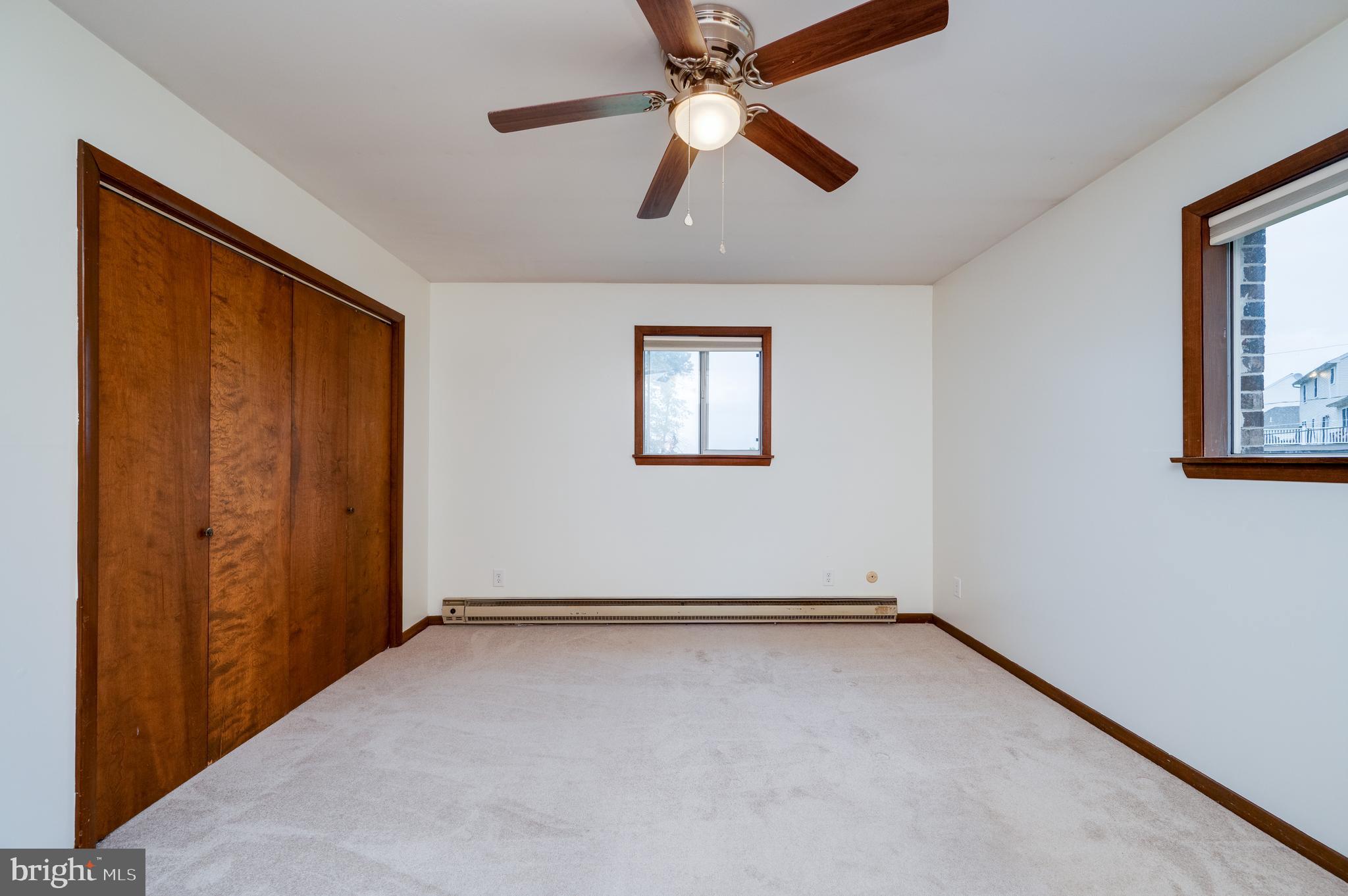 1029 Crestview Avenue Reading, PA 19607 - Photo 24 of 44 an empty room with windows and fan