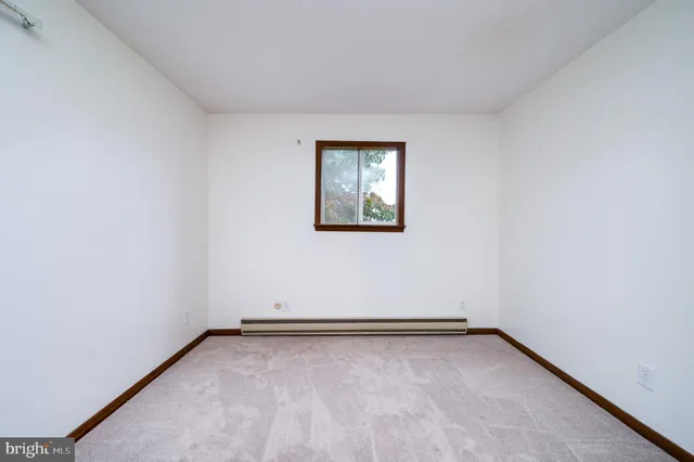 an empty room with a workbench