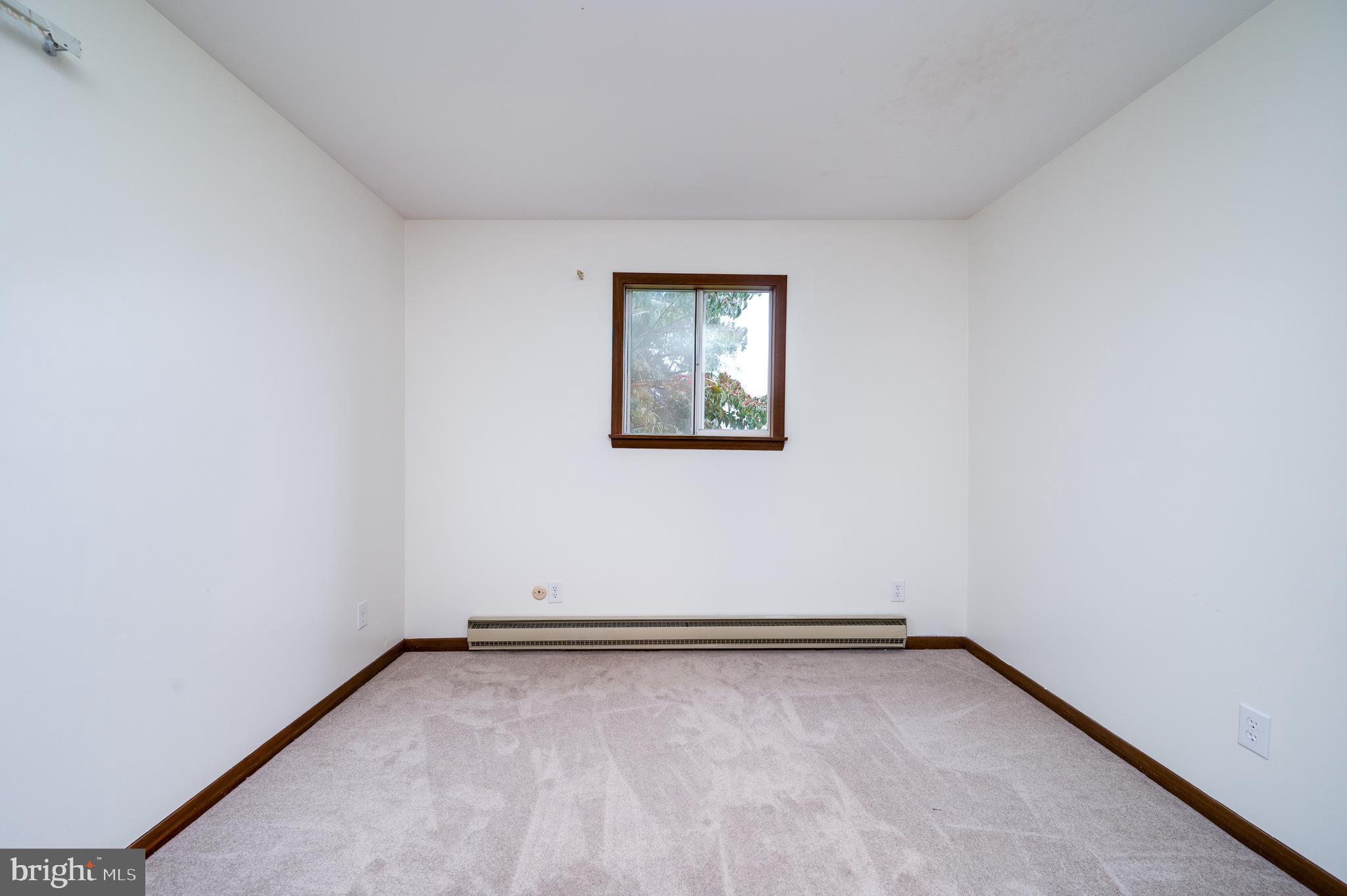 1029 Crestview Avenue Reading, PA 19607 - Photo 27 of 44 an empty room with a workbench