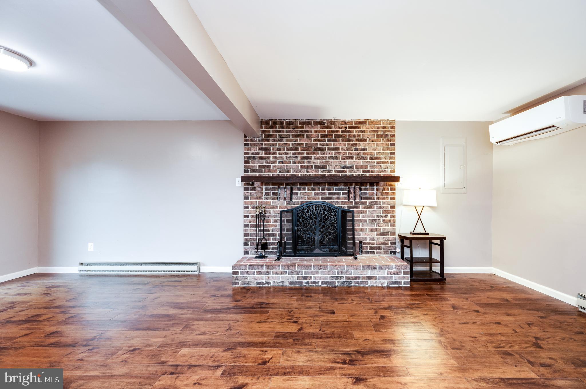 1029 Crestview Avenue Reading, PA 19607 - Photo 29 of 44 a living room with furniture and a fireplace