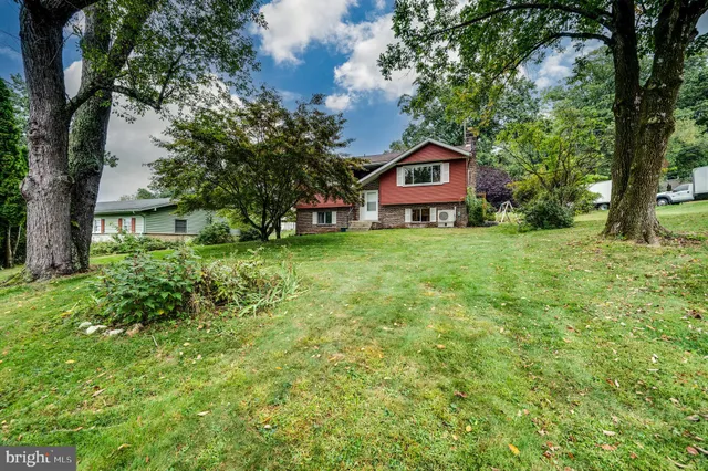 a fire hydrant in the middle of a field