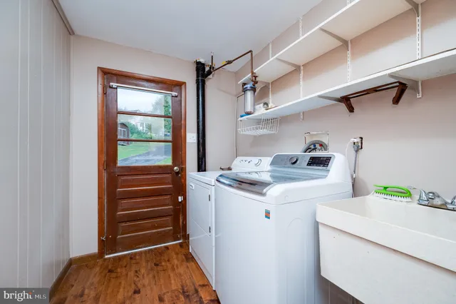 a utility room with dryer and washer
