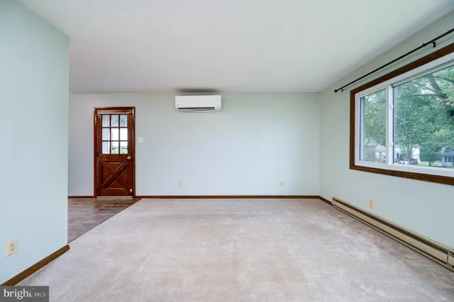 a view of an empty room with window