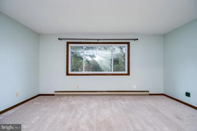an empty room with a window