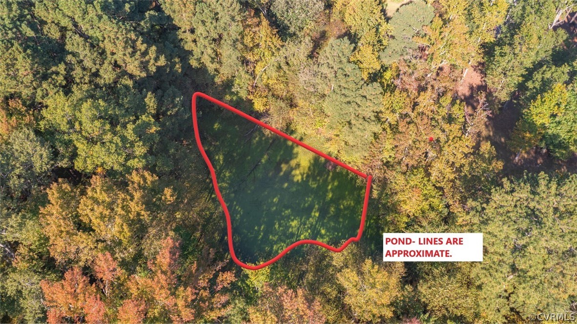 12310 River Road Henrico, VA 23238 - Photo 3 of 10 a sign that is on a brick wall