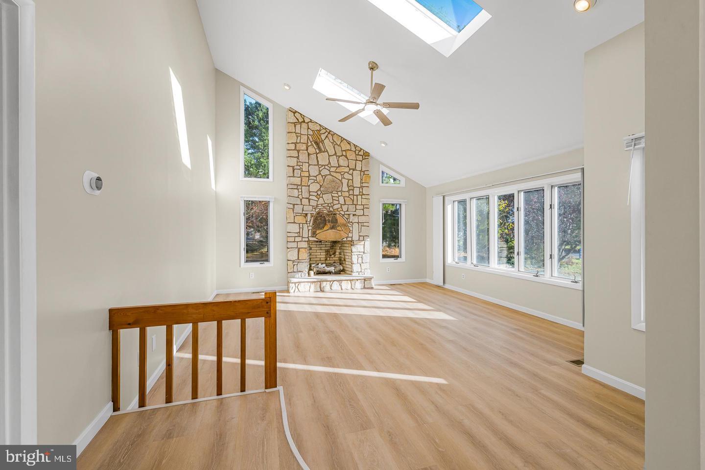 15250 Hudson Road Milton, DE 19968 - Photo 11 of 64 a view of an empty room with wooden floor and a window