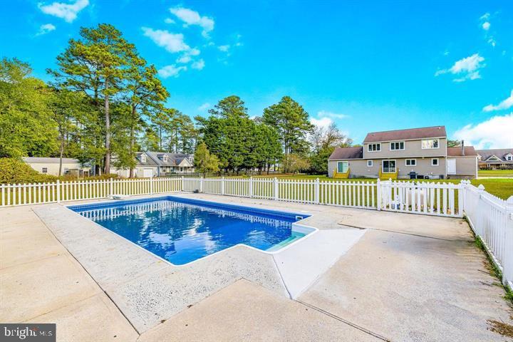 15250 Hudson Road Milton, DE 19968 - Photo 54 of 64 a view of a swimming pool with a patio