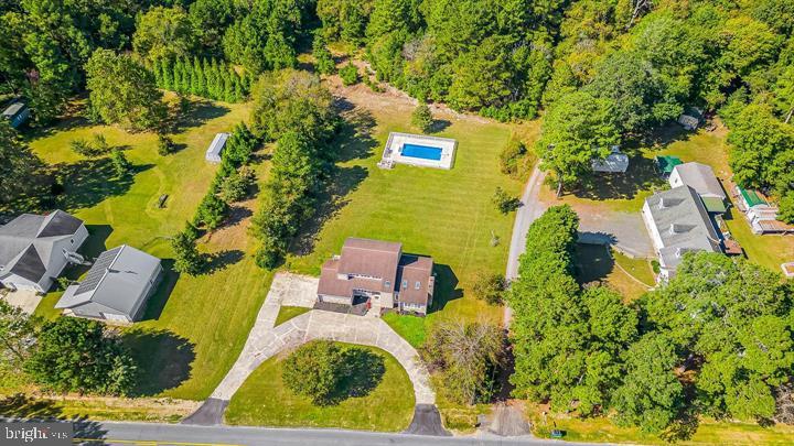 15250 Hudson Road Milton, DE 19968 - Photo 59 of 64 an aerial view of a house with swimming pool and garden space
