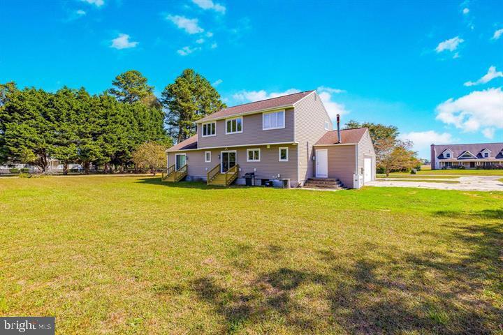 15250 Hudson Road Milton, DE 19968 - Photo 60 of 64 a front view of house with outdoor space and swimming pool