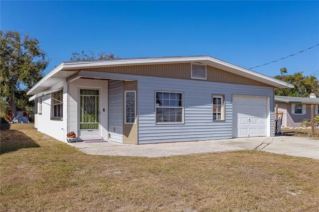 a front view of a house with a porch