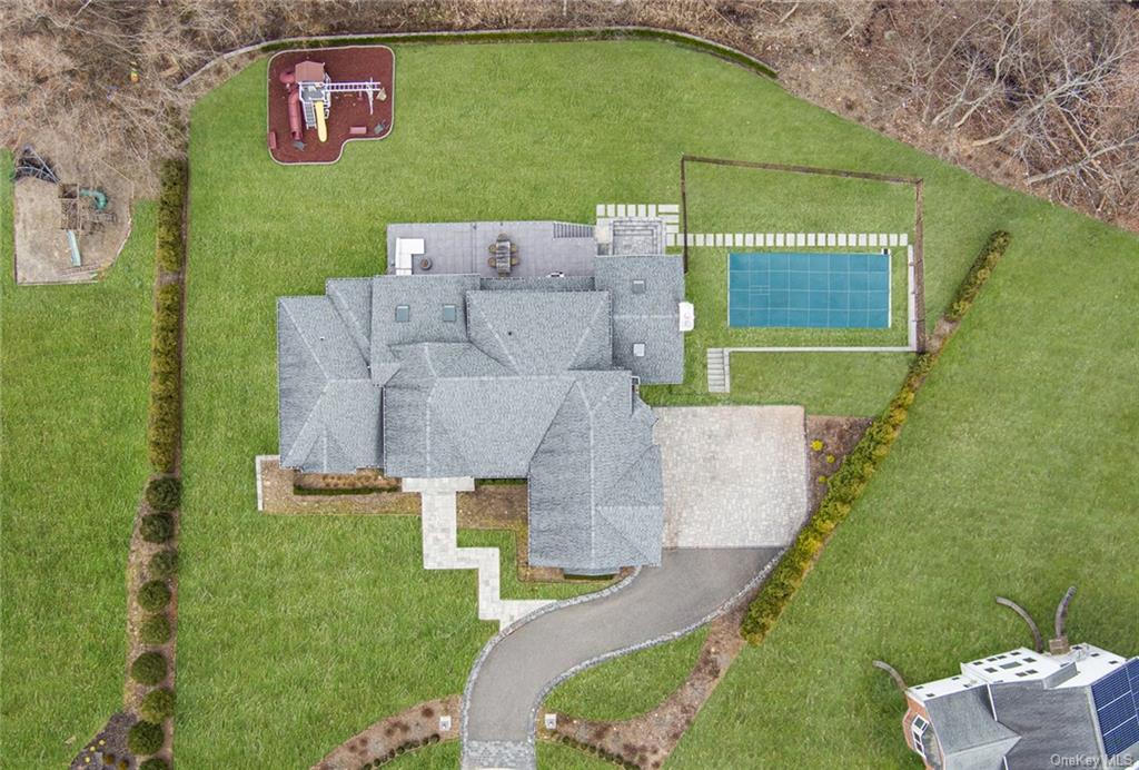 a aerial view of a house with a garden