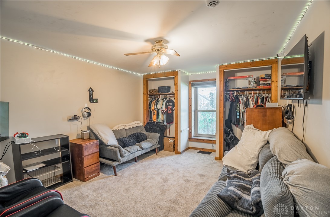 220 Racer Street Troy, OH 45373 - Photo 9 of 33 This inviting bedroom features ample space and dual closets creating a comfortable living area.