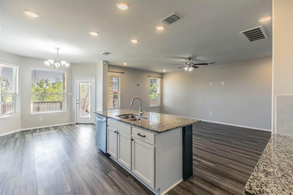 6401 Elephant Butte Drive Waco, TX 76708 - Photo 33 of 34 an empty room with wooden floor and window