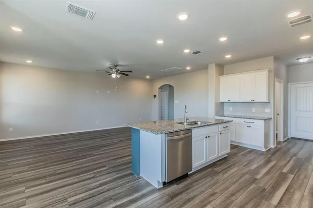 a view of a porch with a small yard