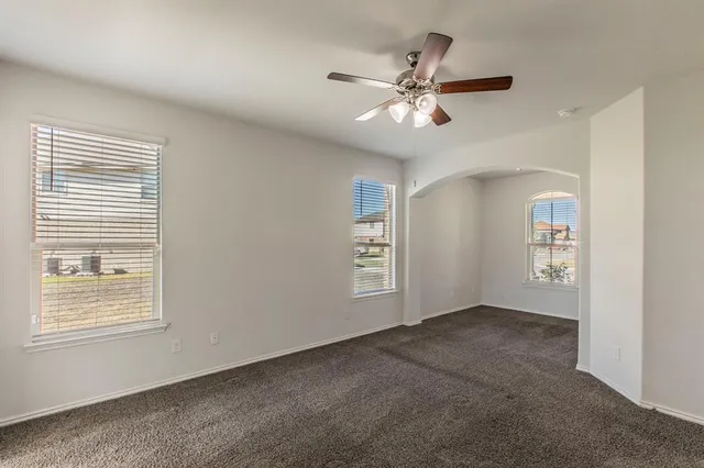 a kitchen with stainless steel appliances granite countertop a sink stove and oven
