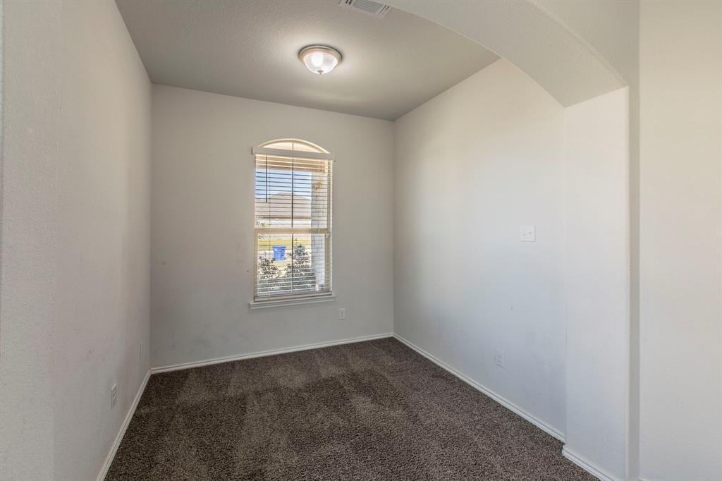 6401 Elephant Butte Drive Waco, TX 76708 - Photo 12 of 34 an empty room with a window
