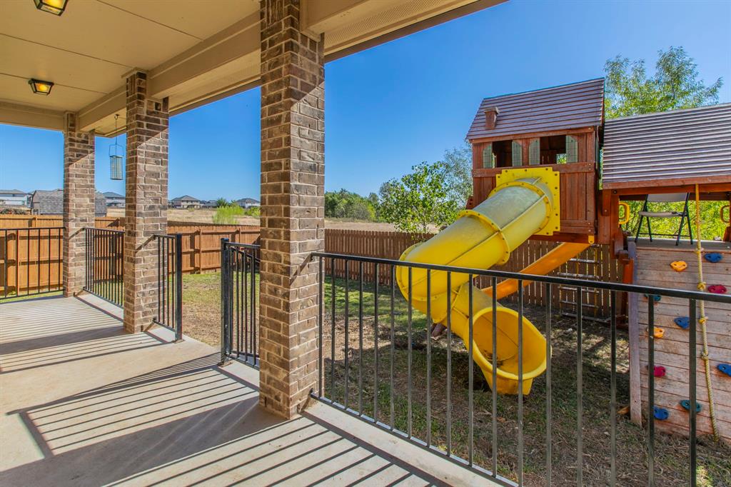 6401 Elephant Butte Drive Waco, TX 76708 - Photo 28 of 34 a view of balcony with wooden floor and outdoor seating