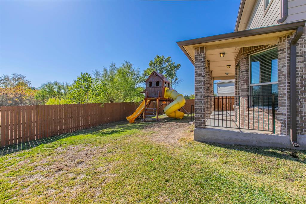 6401 Elephant Butte Drive Waco, TX 76708 - Photo 30 of 34 a view of a porch with a small yard