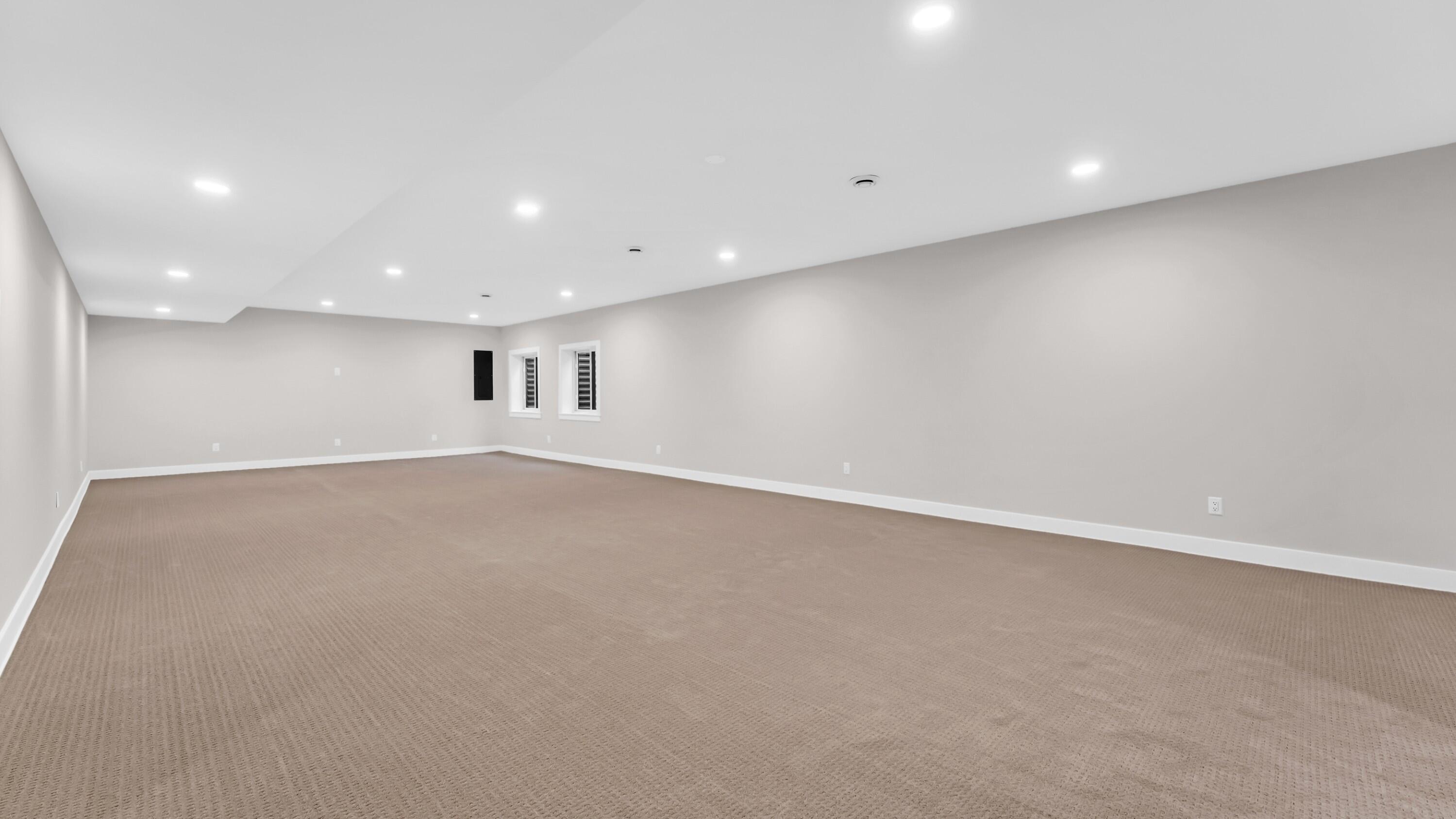525 Maple Street Lake Geneva, WI 53147 - Photo 59 of 70 Beautiful fully carpet lower level family room with adjacent 5th bedroom