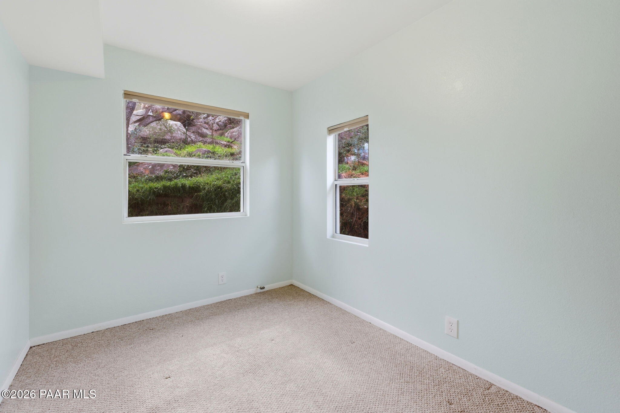 1701 Idylwild Road Prescott, AZ 86305 - Photo 11 of 26 a view of an empty room with a window