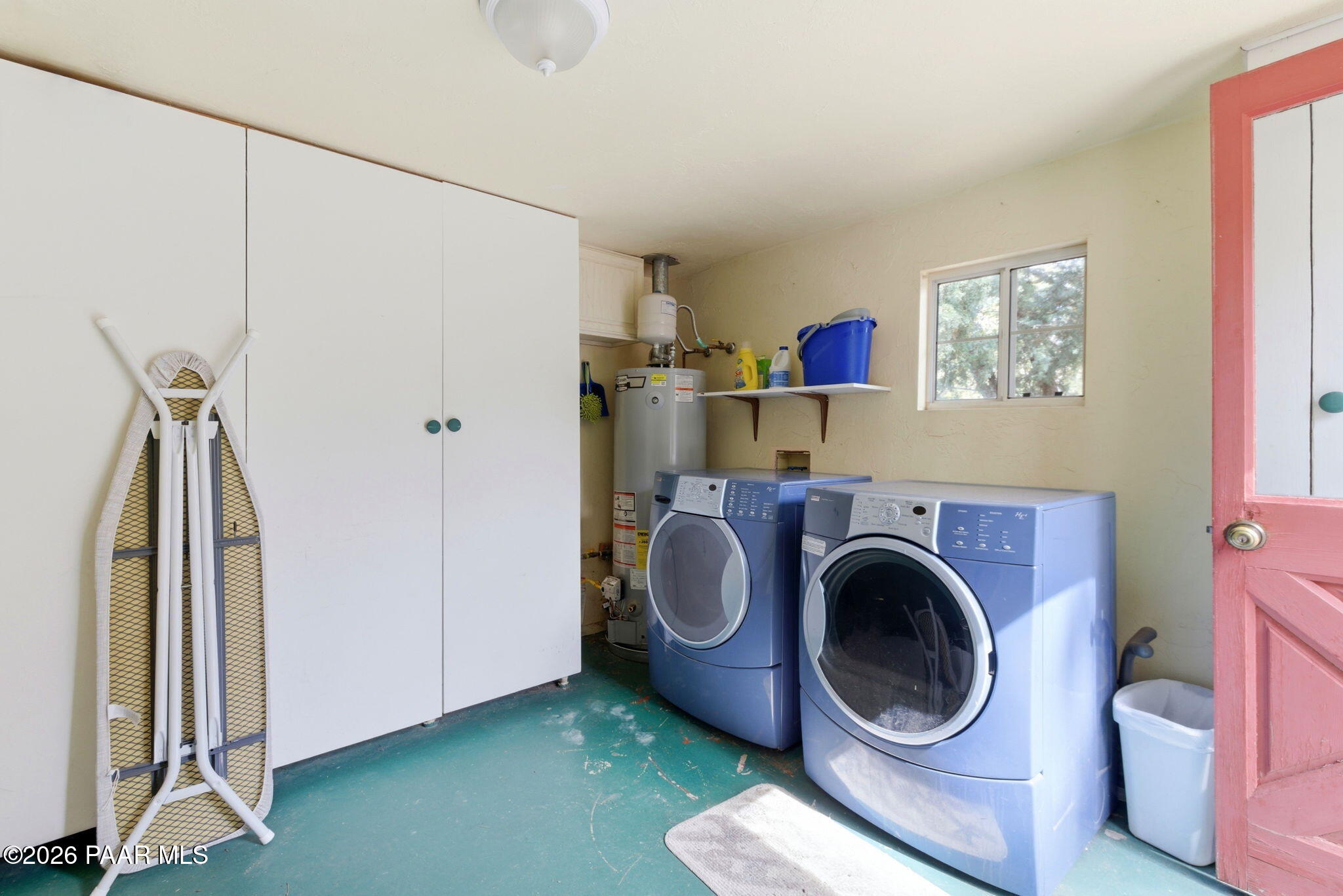 1701 Idylwild Road Prescott, AZ 86305 - Photo 13 of 26 a view of a bedroom with washer and dryer