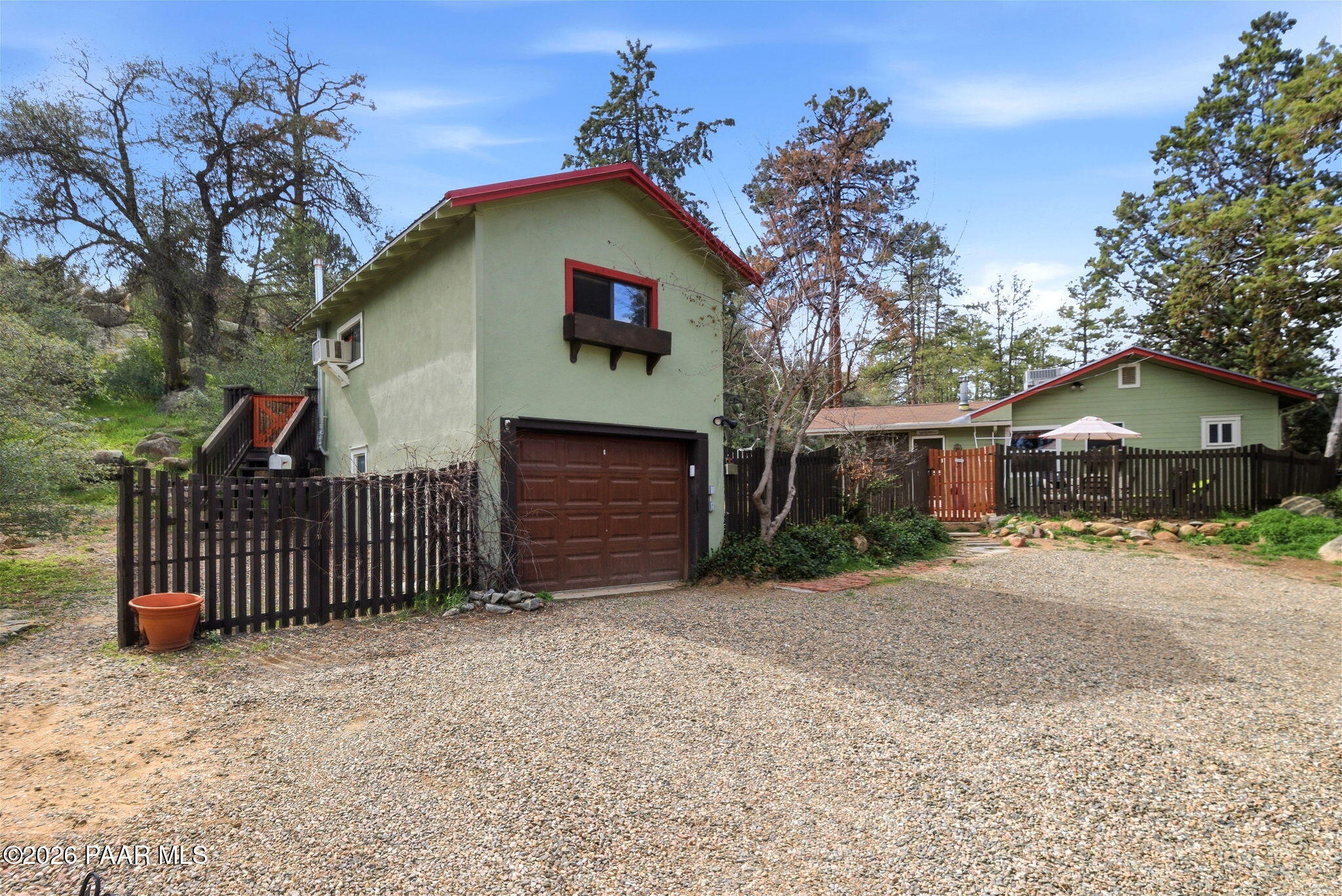 1701 Idylwild Road Prescott, AZ 86305 - Photo 15 of 26 a view of a house with a yard and deck