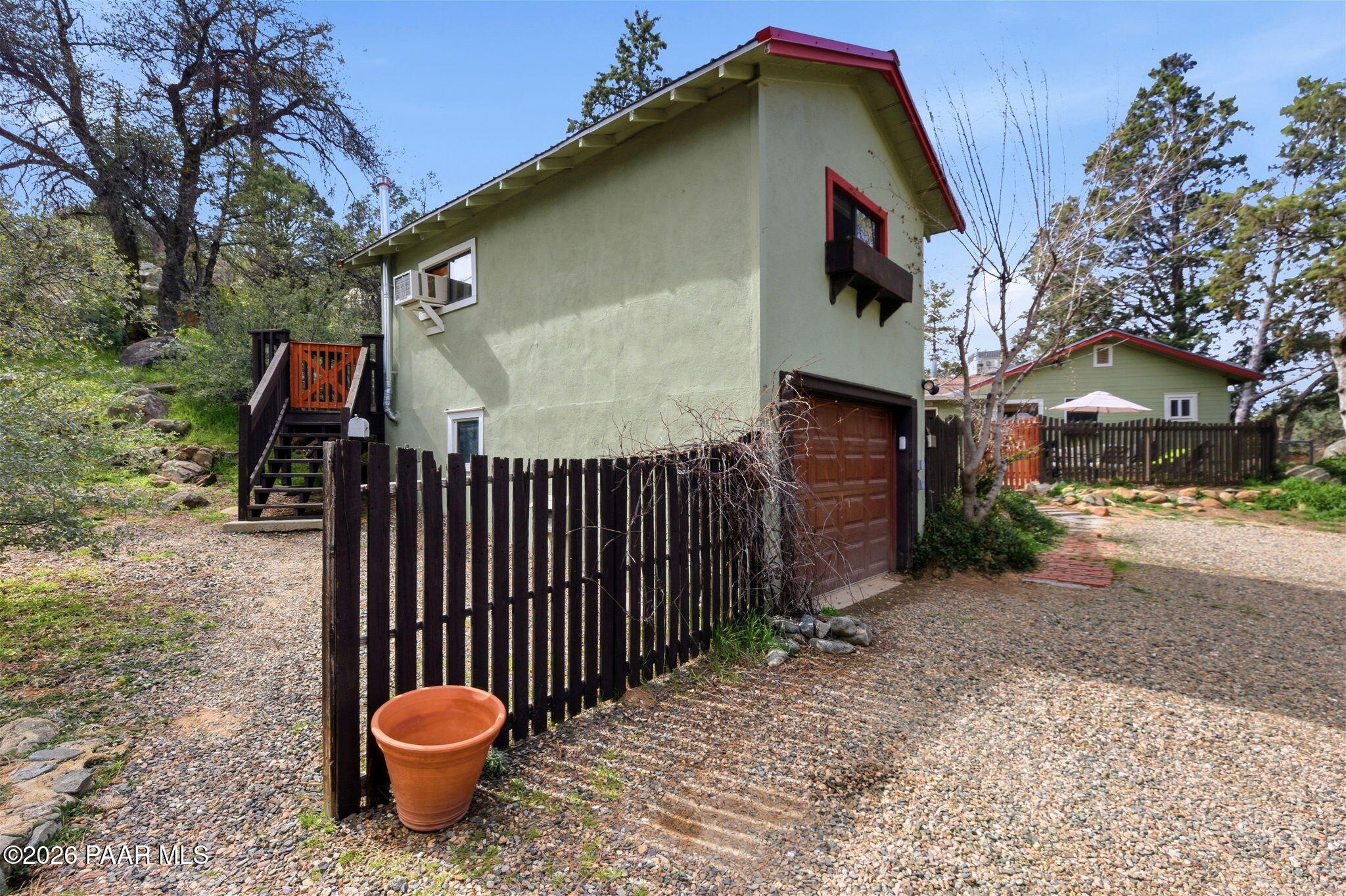 1701 Idylwild Road Prescott, AZ 86305 - Photo 17 of 26 a backyard of a house with table and chairs