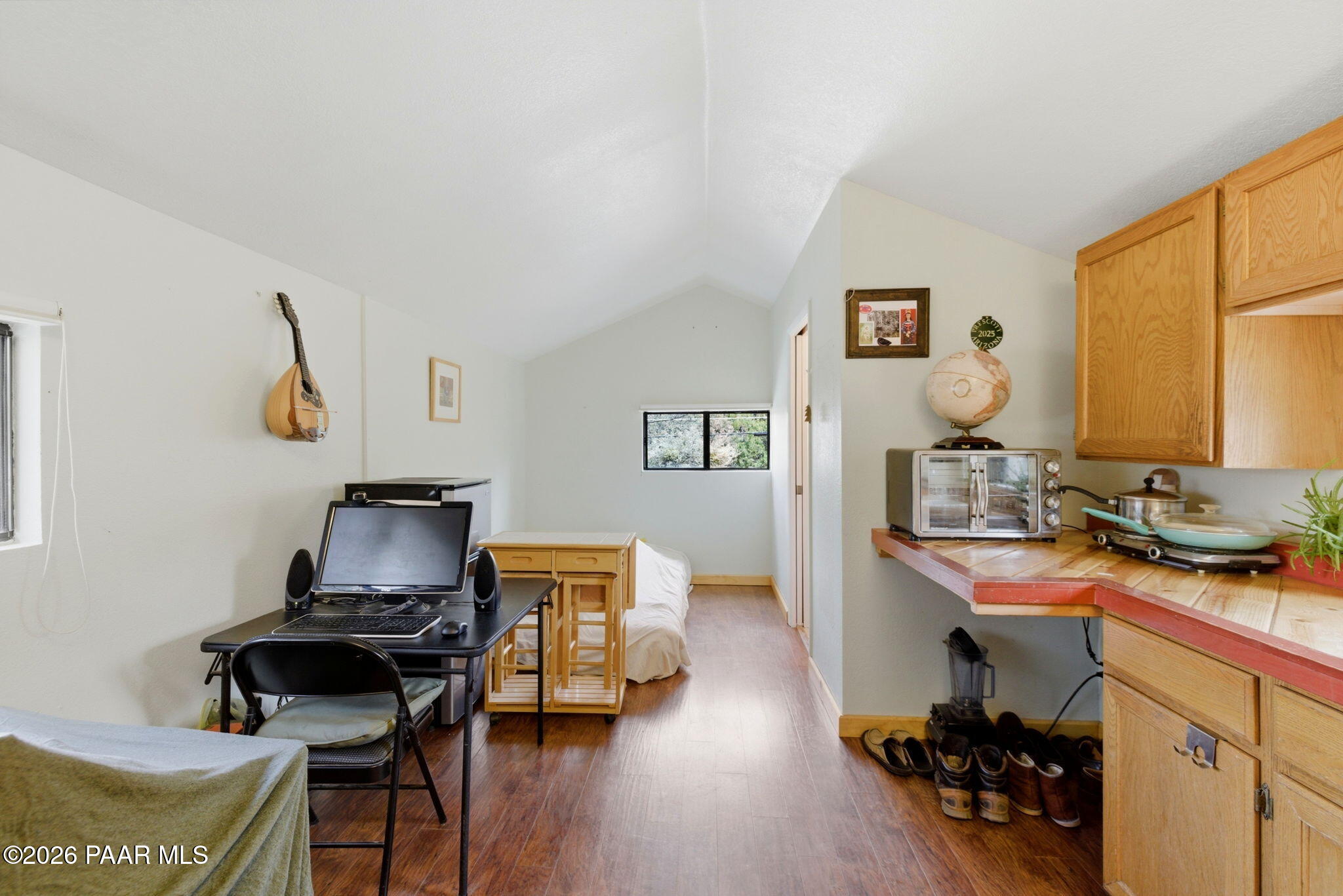 1701 Idylwild Road Prescott, AZ 86305 - Photo 25 of 26 a view of a workspace with furniture and a window