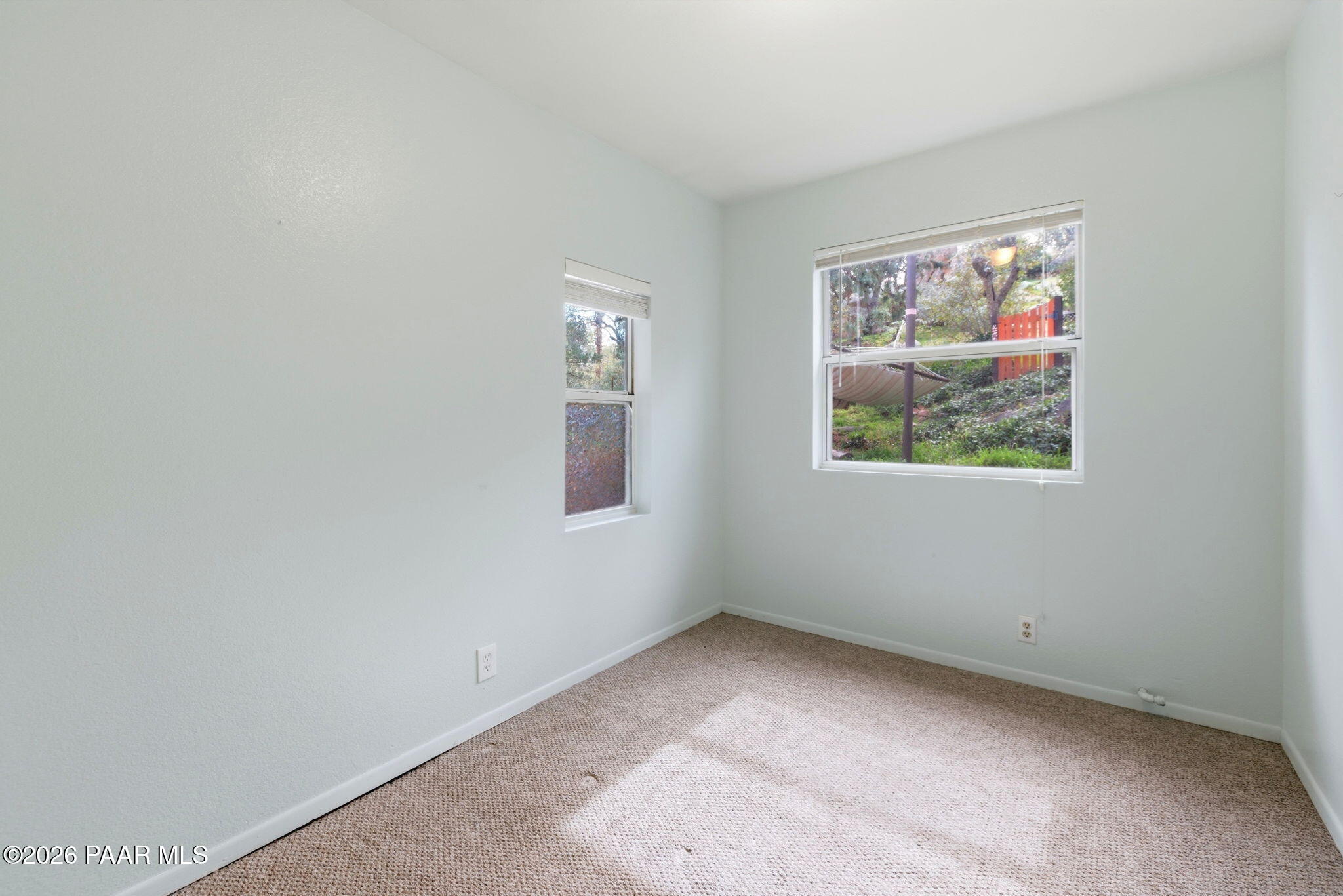 1701 Idylwild Road Prescott, AZ 86305 - Photo 10 of 26 a view of an empty room with windows
