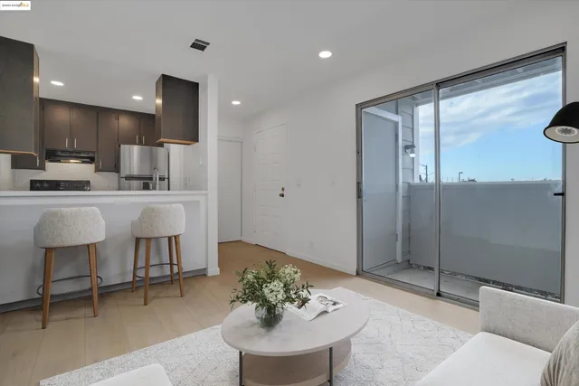 a kitchen with a table and chairs