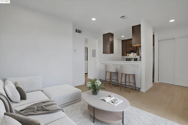 a view of a kitchen with a sink