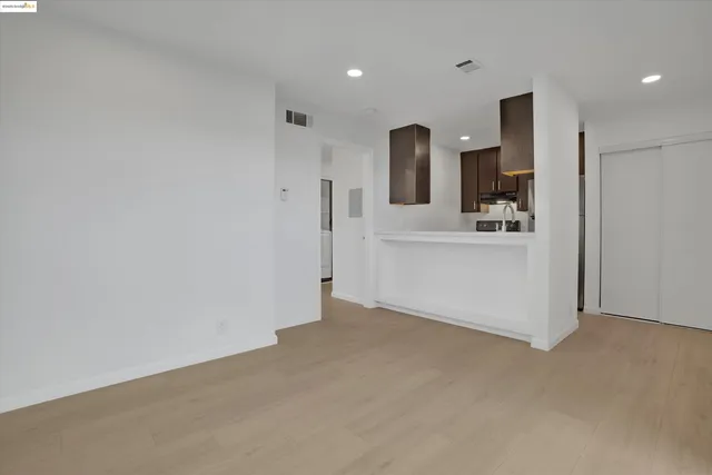 a bathroom with a sink a mirror and a toilet