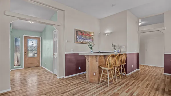 wooden floor and chair in a room