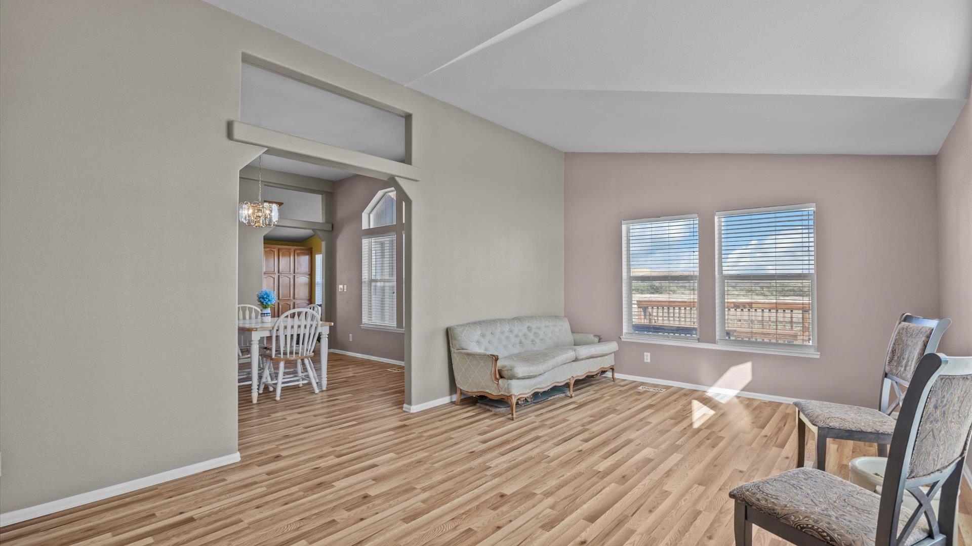 710 Old Highway Mack, CO 81525 - Photo 24 of 41 a living room with furniture and a wooden floor