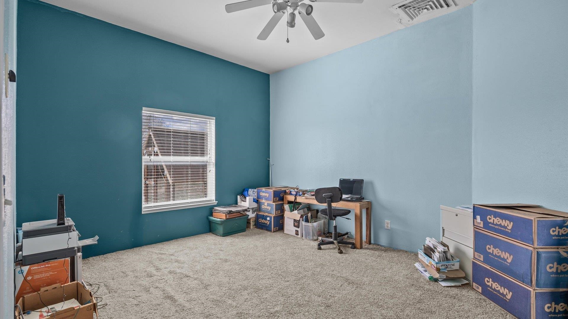 710 Old Highway Mack, CO 81525 - Photo 28 of 40 a bedroom with furniture and a window