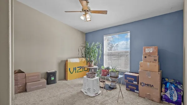 a room with furniture and a window