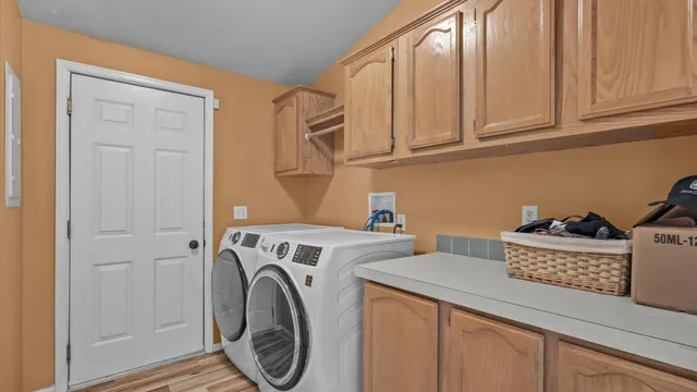 a utility room with dryer and washer