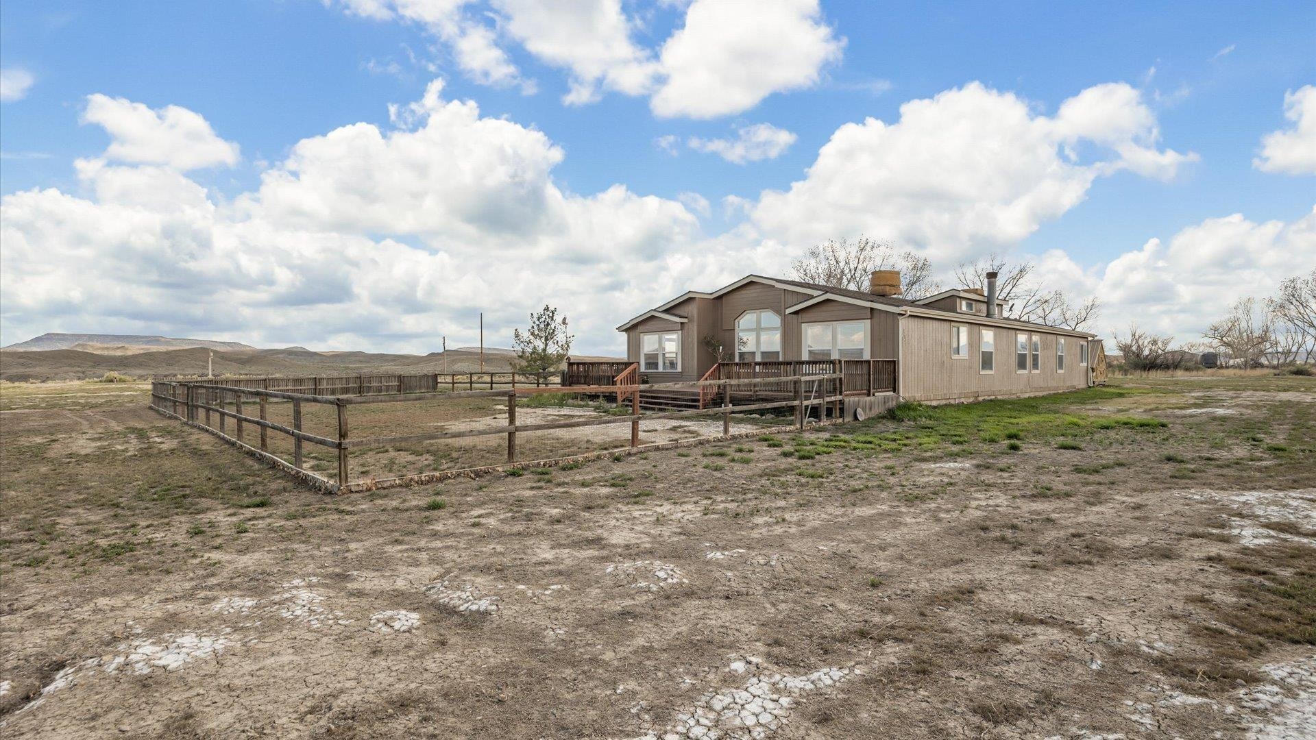 710 Old Highway Mack, CO 81525 - Photo 38 of 41 a view of a house with wooden fence
