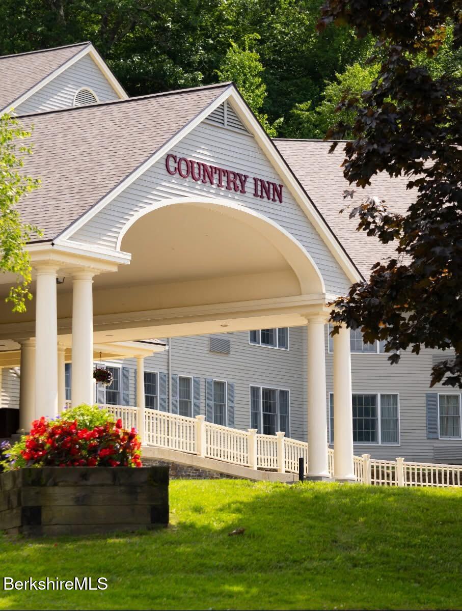 a view of a house with a swimming pool