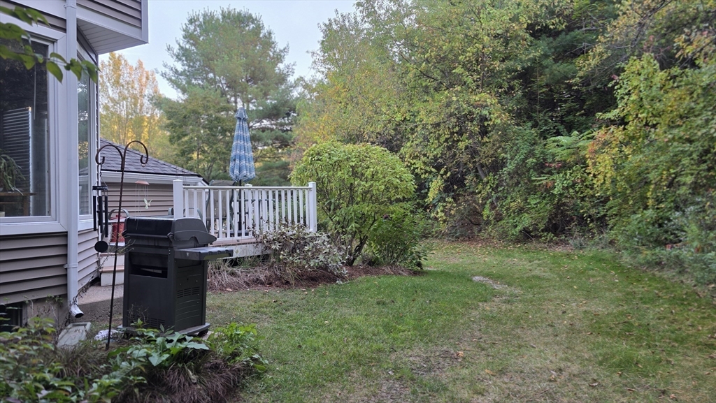 61 Southview Drive, Unit 61 Southwick, MA 01077 - Photo 13 of 28 a view of a backyard with garden