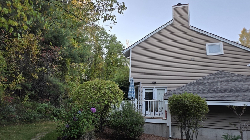 61 Southview Drive, Unit 61 Southwick, MA 01077 - Photo 27 of 28 a house that has a tree in front of it