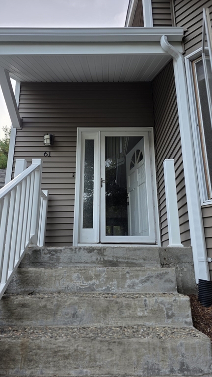 61 Southview Drive, Unit 61 Southwick, MA 01077 - Photo 3 of 28 a view of a house with a door