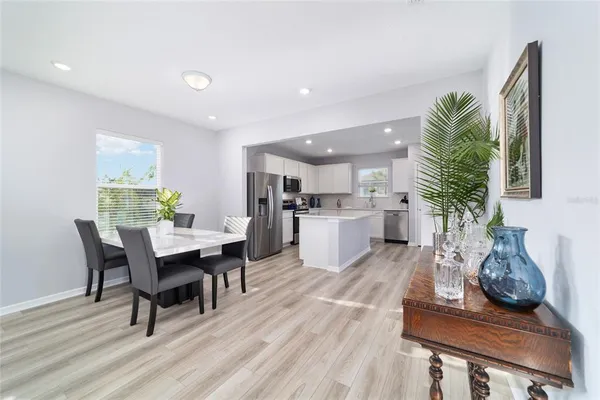 a living room with furniture and a table